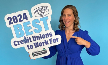 Carrie Iafrate poses with Best Credit Unions to work for prop